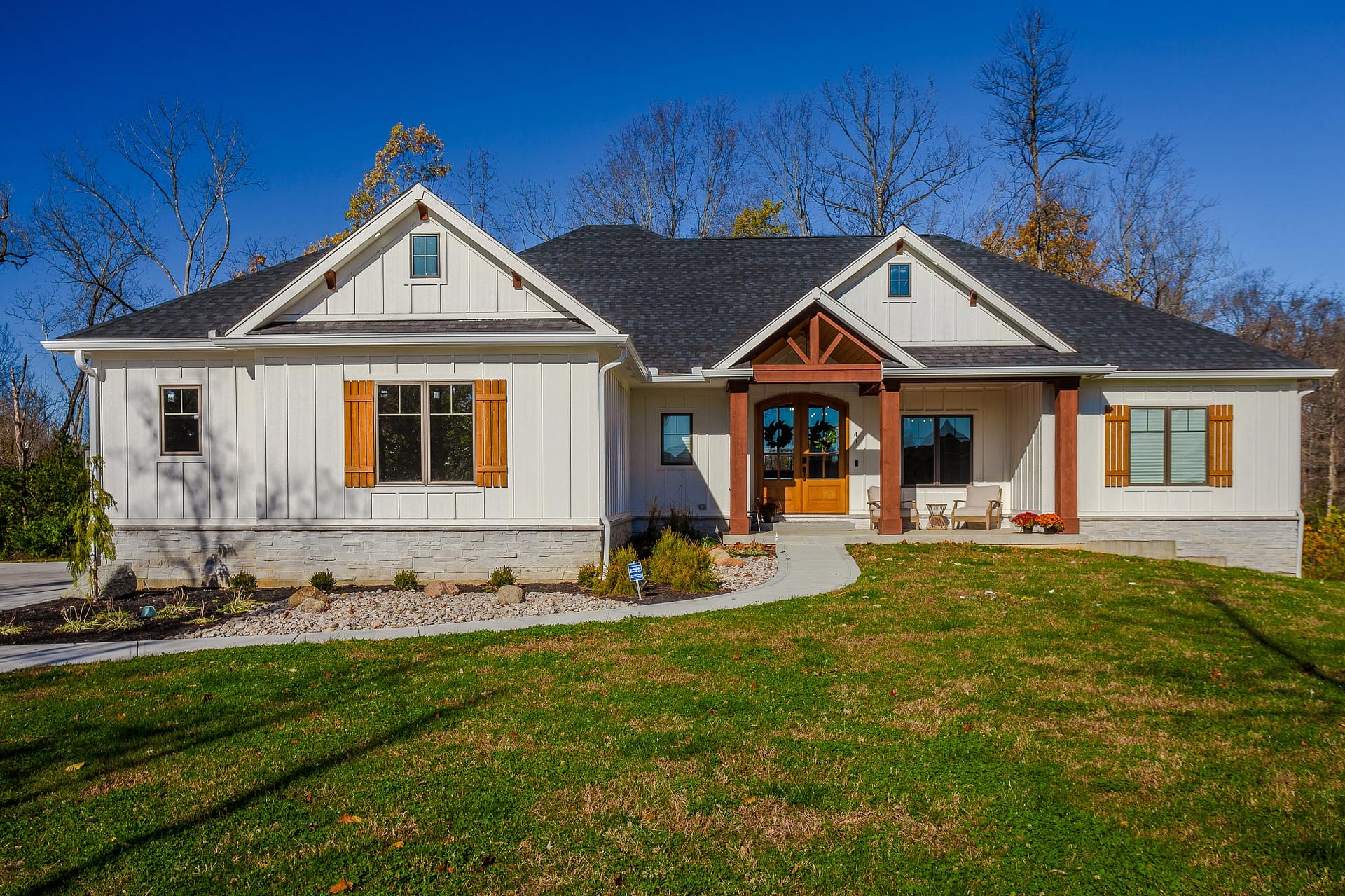 High-End Development - Luxury custom home exterior in high-end neighborhood in Centerville